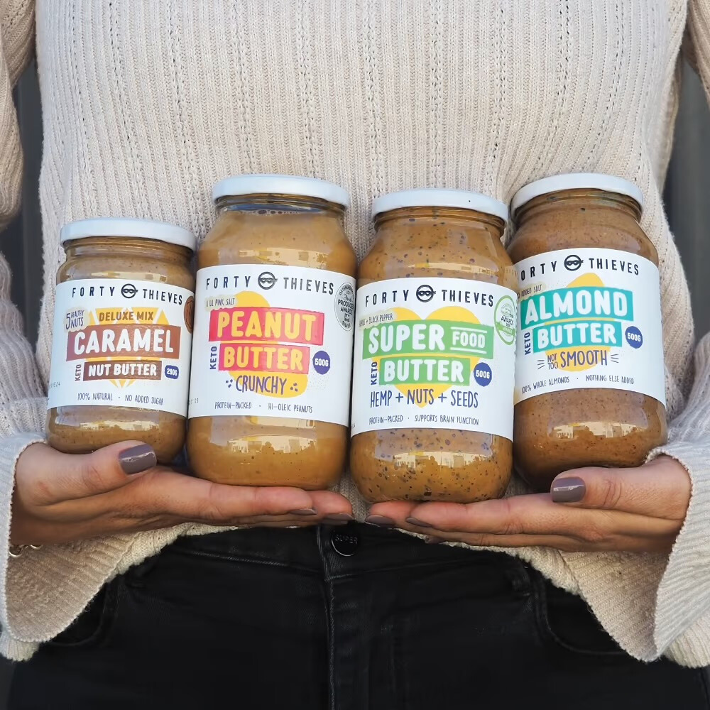 A bundle of four different peanut butters from organic nut company 40 Thieves.